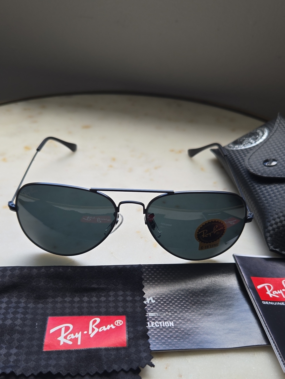Ray-Ban Aviator Sunglasses with Dark Lenses